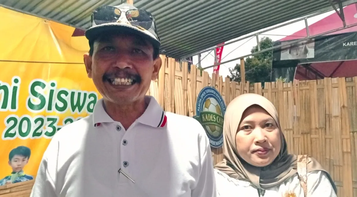 Kepala Desa Jambewangi, Masykur, memberikan keterangannya seusai gelaran Turnamen Kades Cup Jambewangi 2026. 
