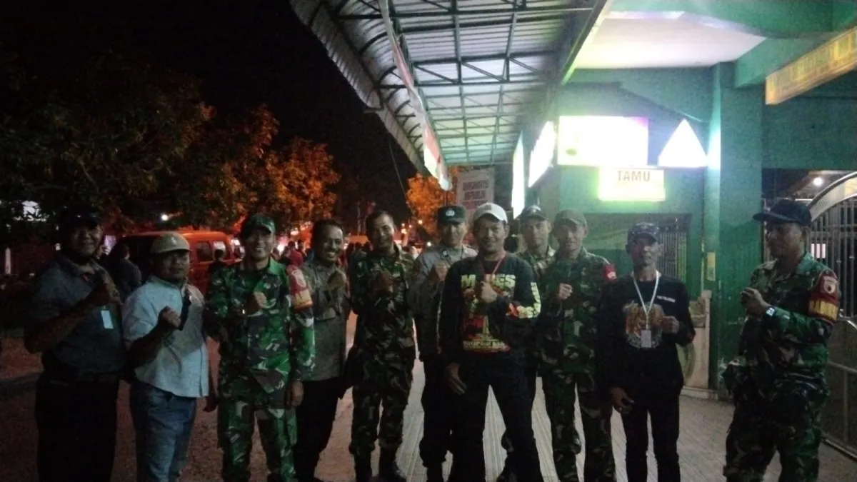 Ketua PAC PP Tulangan Memet Bersama Banser dan TNI-Polri Kawal Gebyar HUT RI ke-81 di Grabagan